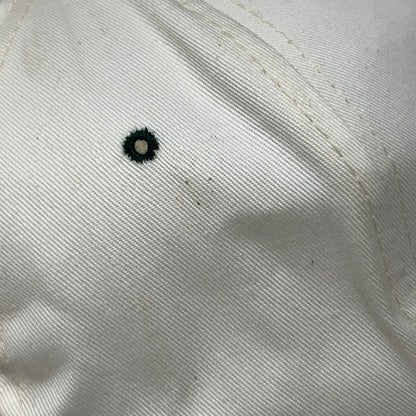 Vintage hat snapback in white with green logo detail, front view