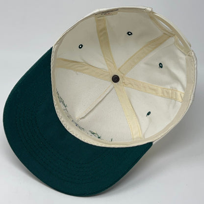 Vintage hat snapback in green with a front view of interior design