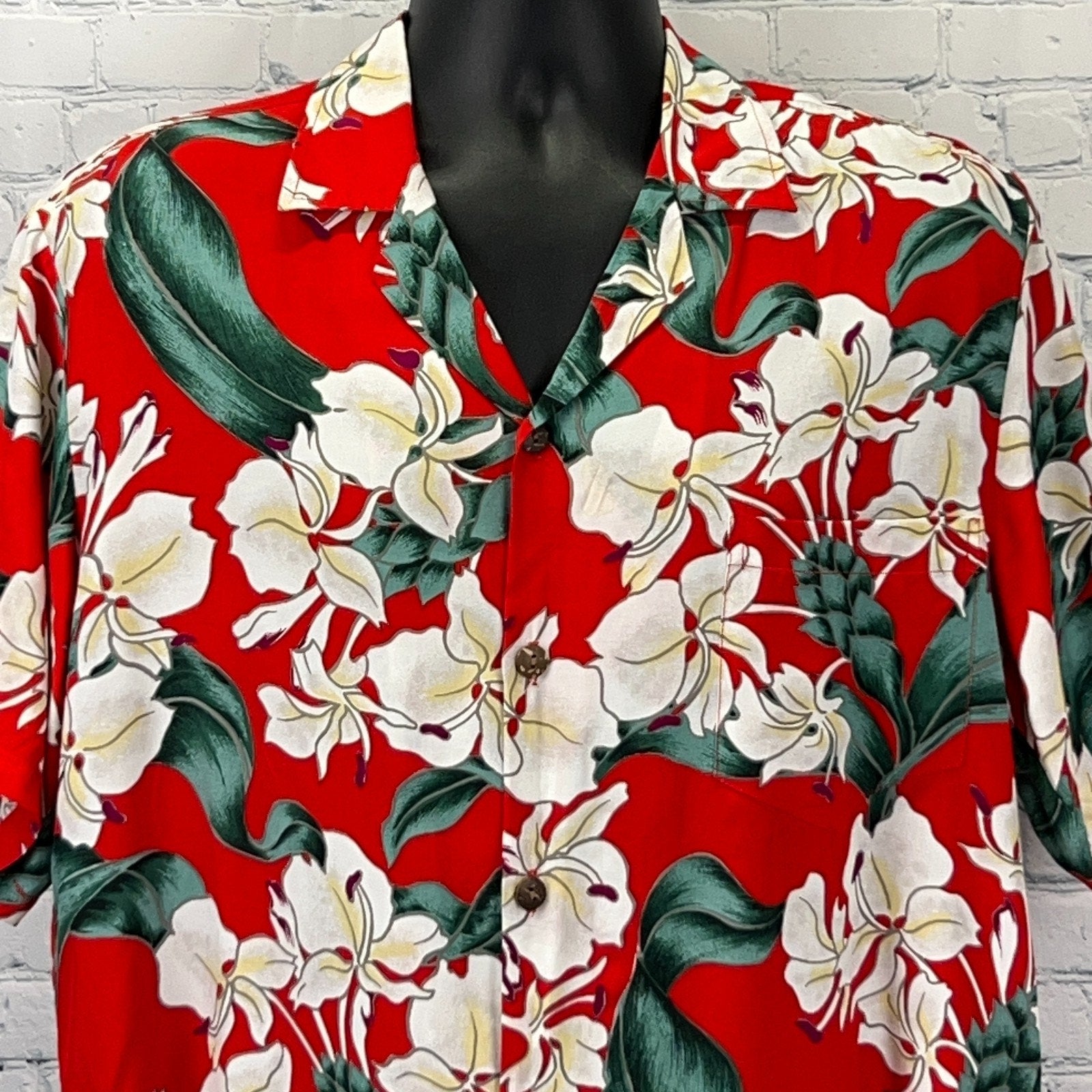 Vintage Hawaiian Shirt in vibrant red with floral patterns, featuring a front view and wooden buttons