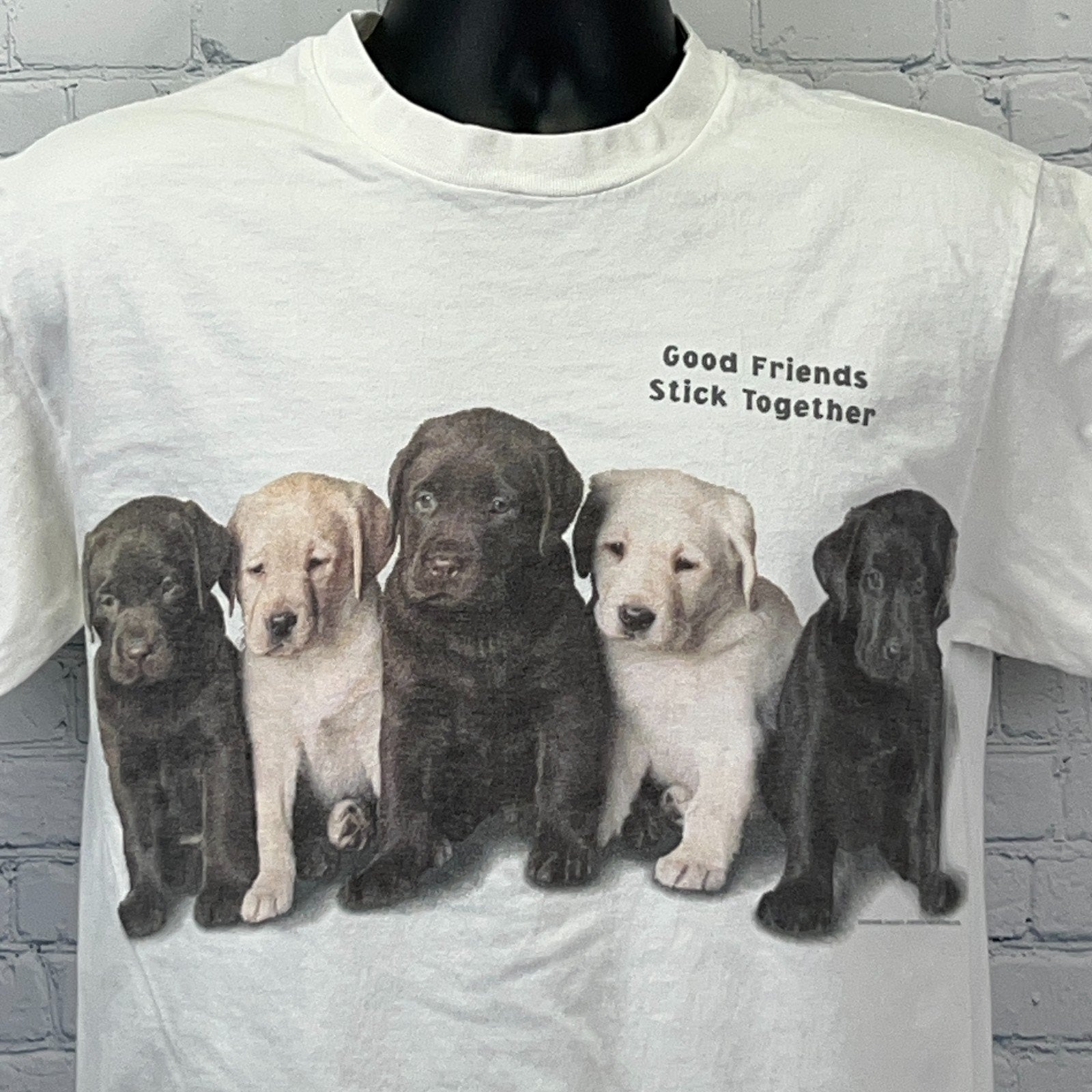 Hanes white T-shirt featuring five Labrador Retriever puppies with the phrase Good Friends Stick Together