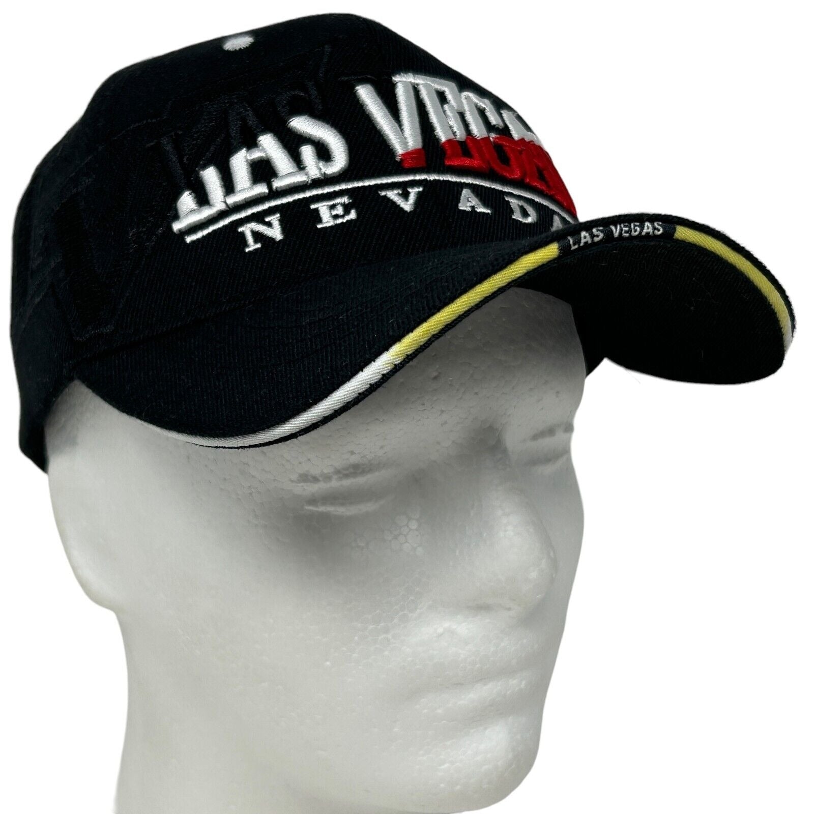 Front view of a black Chelona hat with Las Vegas text and logo, featuring an adjustable strap.