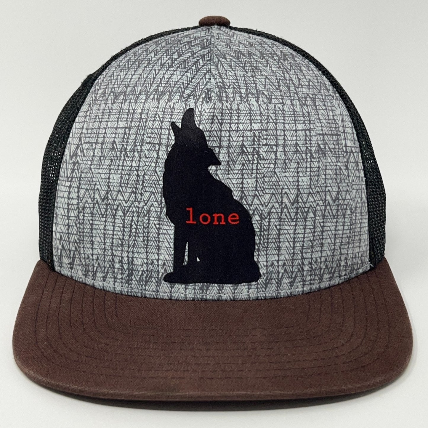 prAna Lone Wolf Cap in Gray and Brown with Wolf Silhouette and 'lone' Text on Front