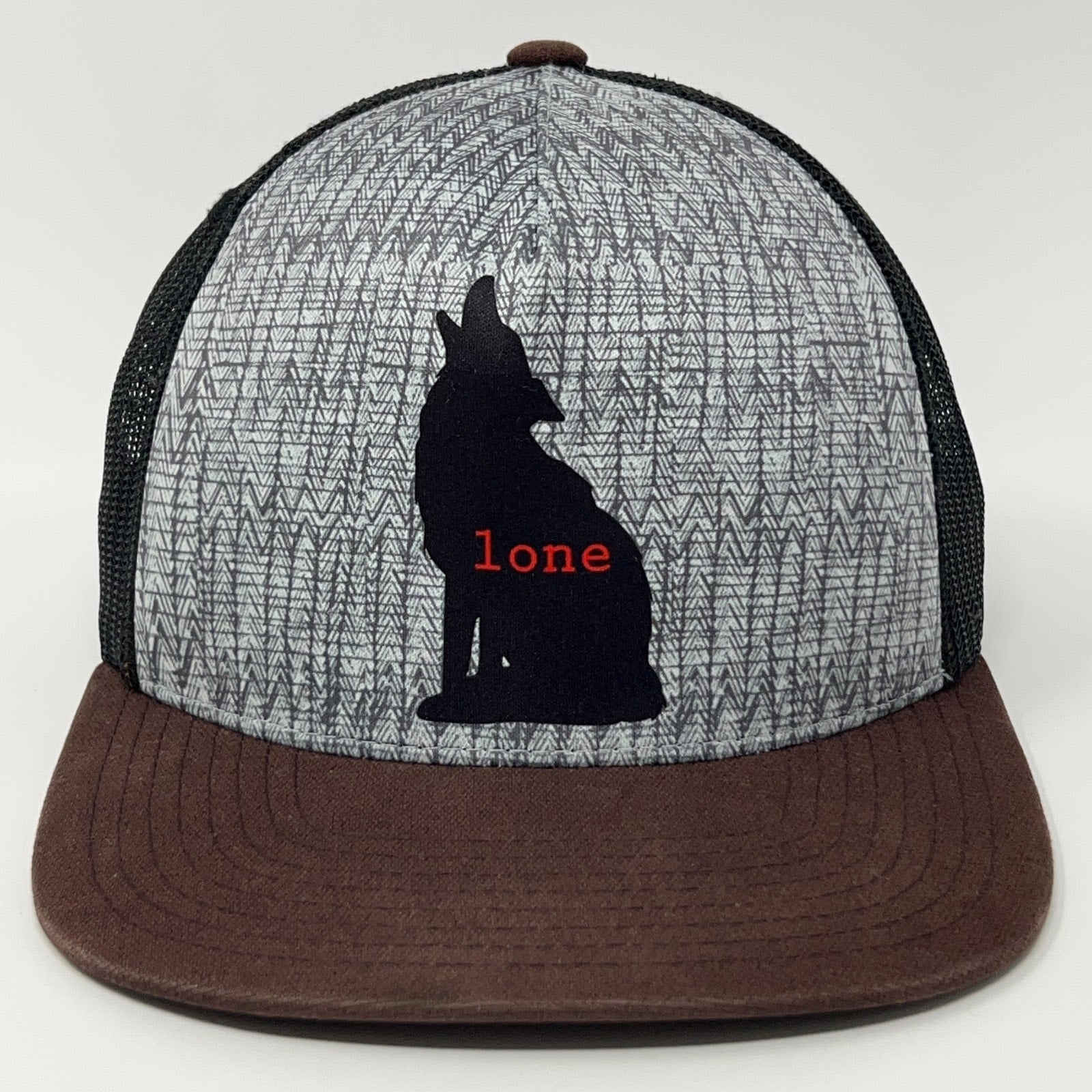 prAna Lone Wolf Cap in Gray and Brown with Wolf Silhouette and 'lone' Text on Front