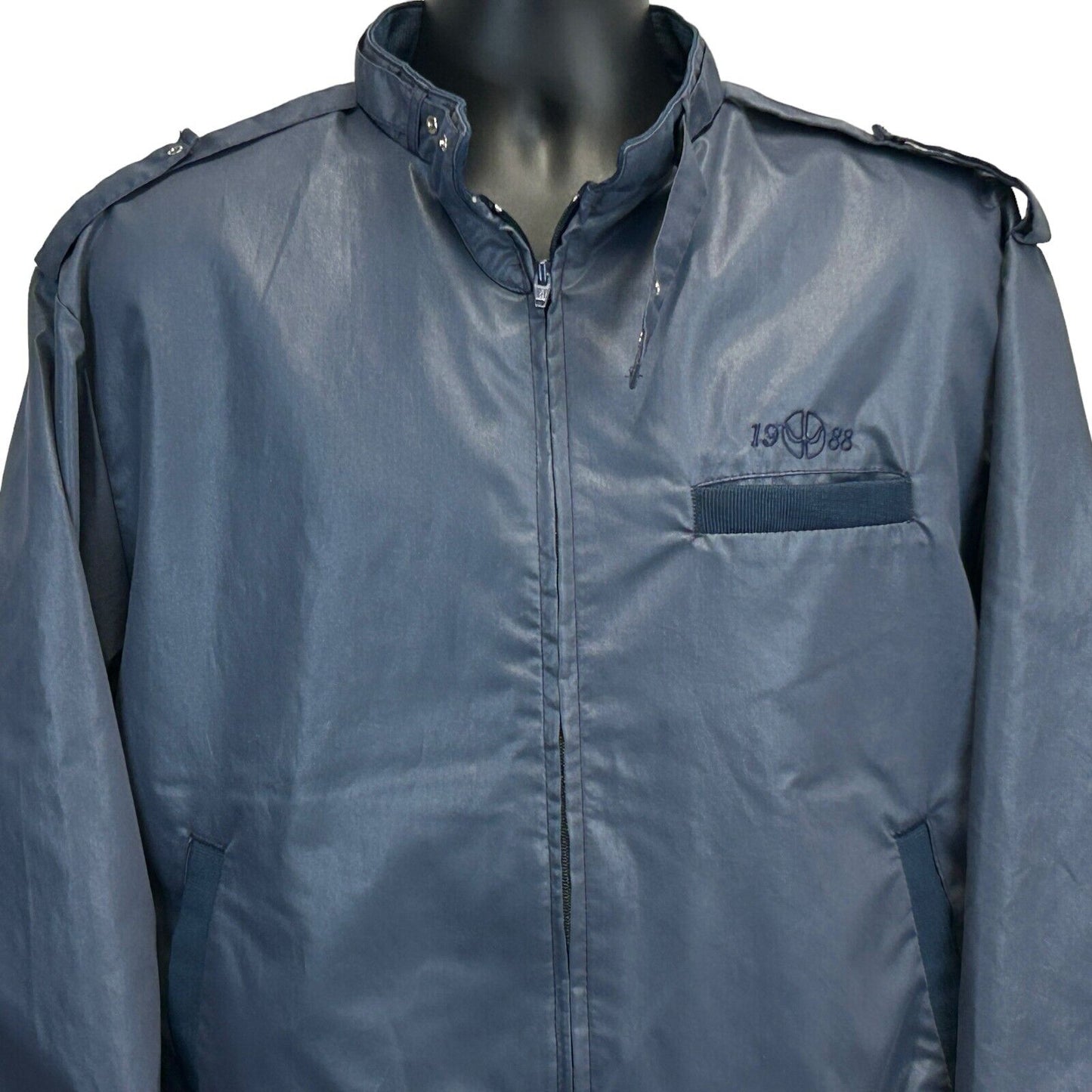 Dunbrooke Cafe Racer Jacket in dark blue featuring a front zip closure and chest logo detail