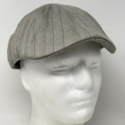 Vintage Stone Gray Flat Cap featuring herringbone pattern, viewed from the front on mannequin head