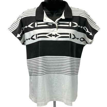 Head Tennis Polo Shirt in Black and White, Size Medium, Front View with Unique Pattern and Logo