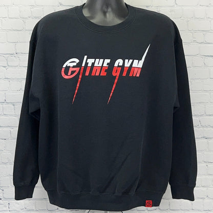 Black sweatshirt with front logo reading The Gym in red and white, featuring a relaxed fit and ribbed cuffs