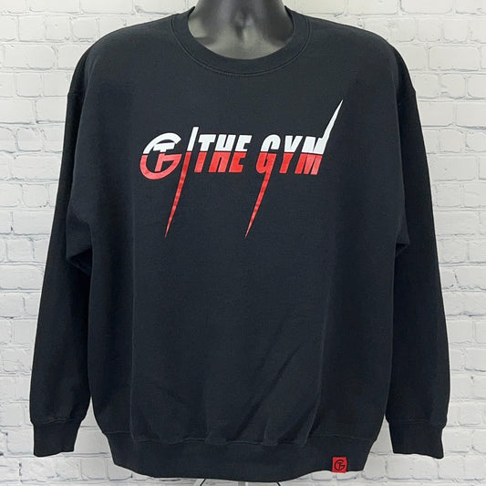 Black sweatshirt with front logo reading The Gym in red and white, featuring a relaxed fit and ribbed cuffs