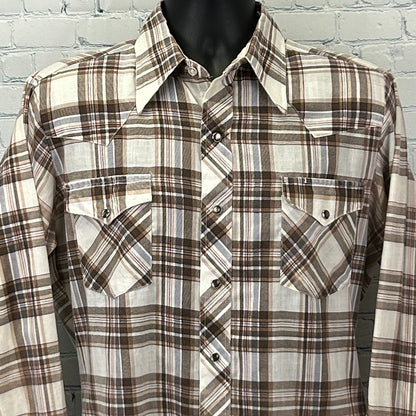 Front view of a Vintage Western Shirt in brown and cream plaid, featuring snap pockets and pointed yokes