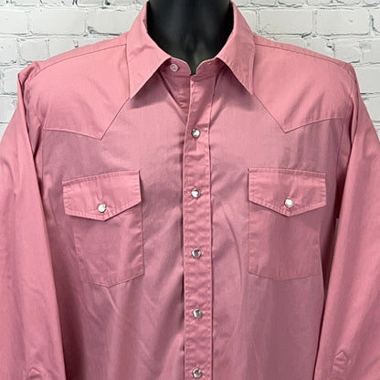 Front view of Malco Modes Western Shirt in pink, featuring classic snap buttons and dual chest pockets