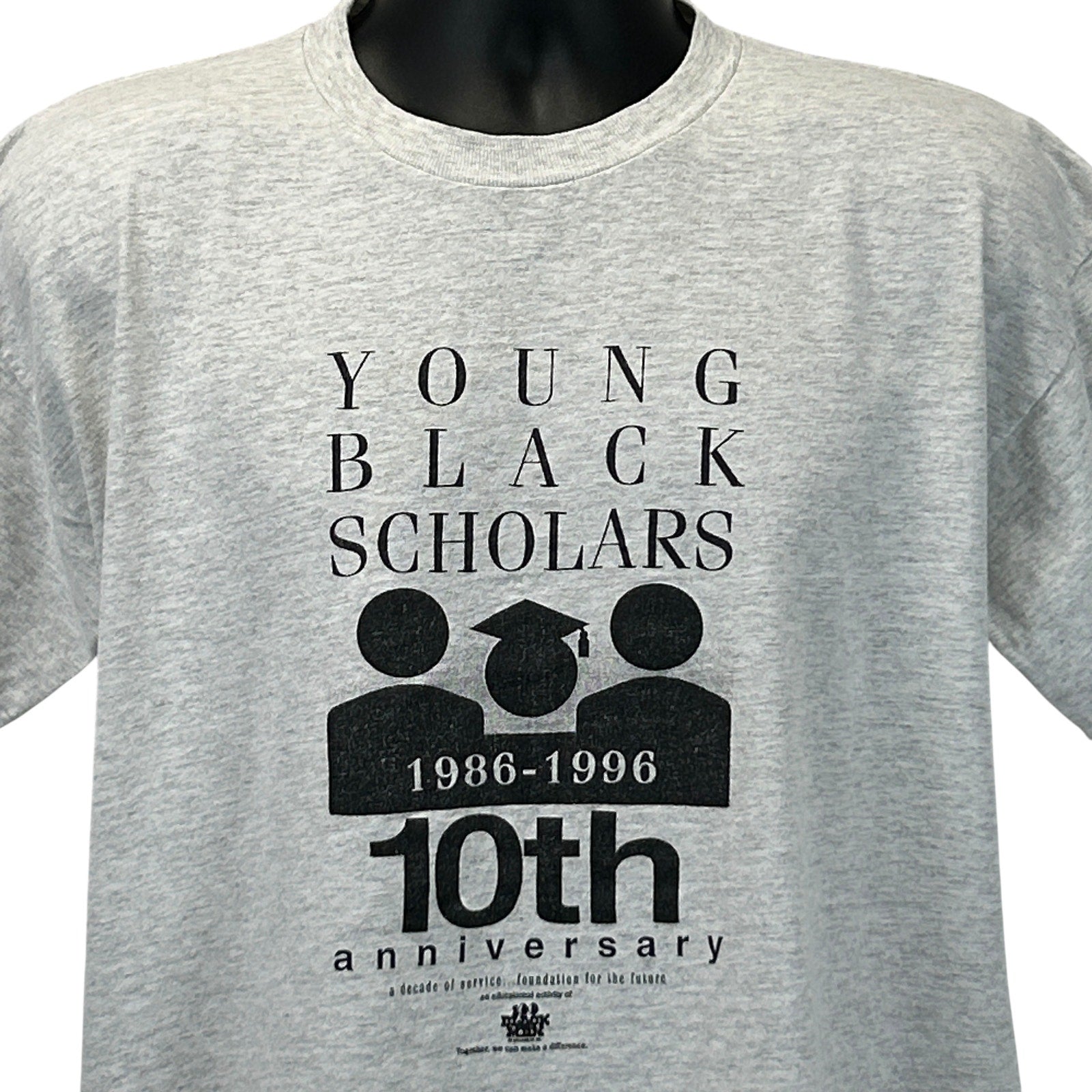Gray Vintage T-Shirt featuring Young Black Scholars anniversary graphic on the front