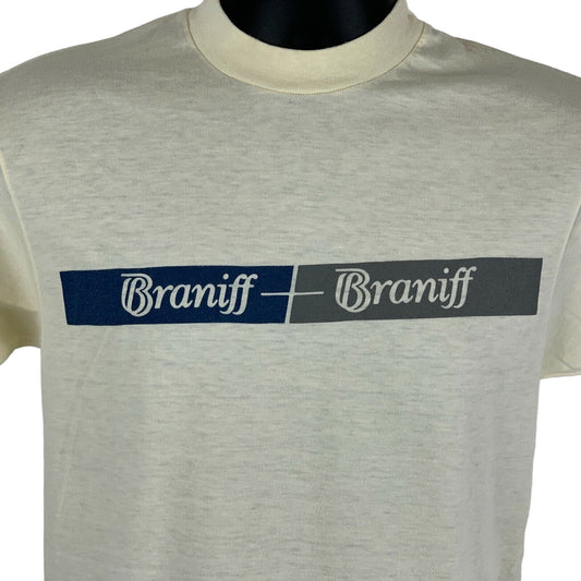 Front view of Vintage Braniff Airways T-Shirt in cream with a bold logo design across the chest