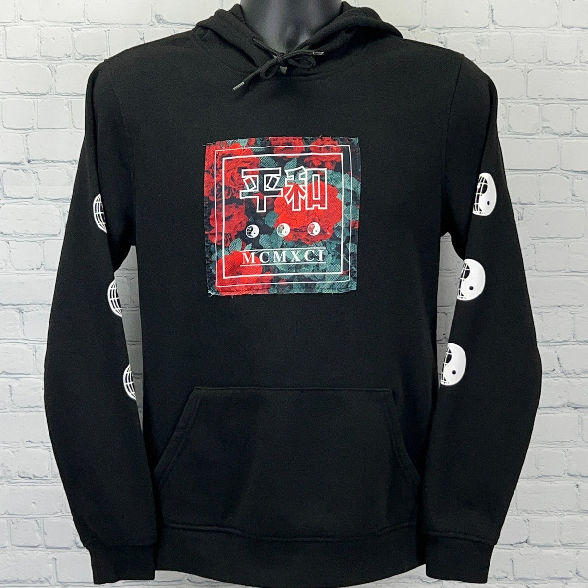 Brooklyn Cloth black hoodie in size small with bold graphic print on front and sleeves