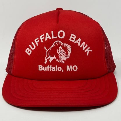 Red Vintage Trucker Hat featuring Buffalo Bank logo, front view, with mesh back for ventilation