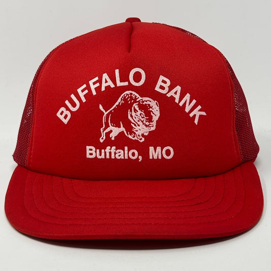 Red Vintage Trucker Hat featuring Buffalo Bank logo, front view, with mesh back for ventilation