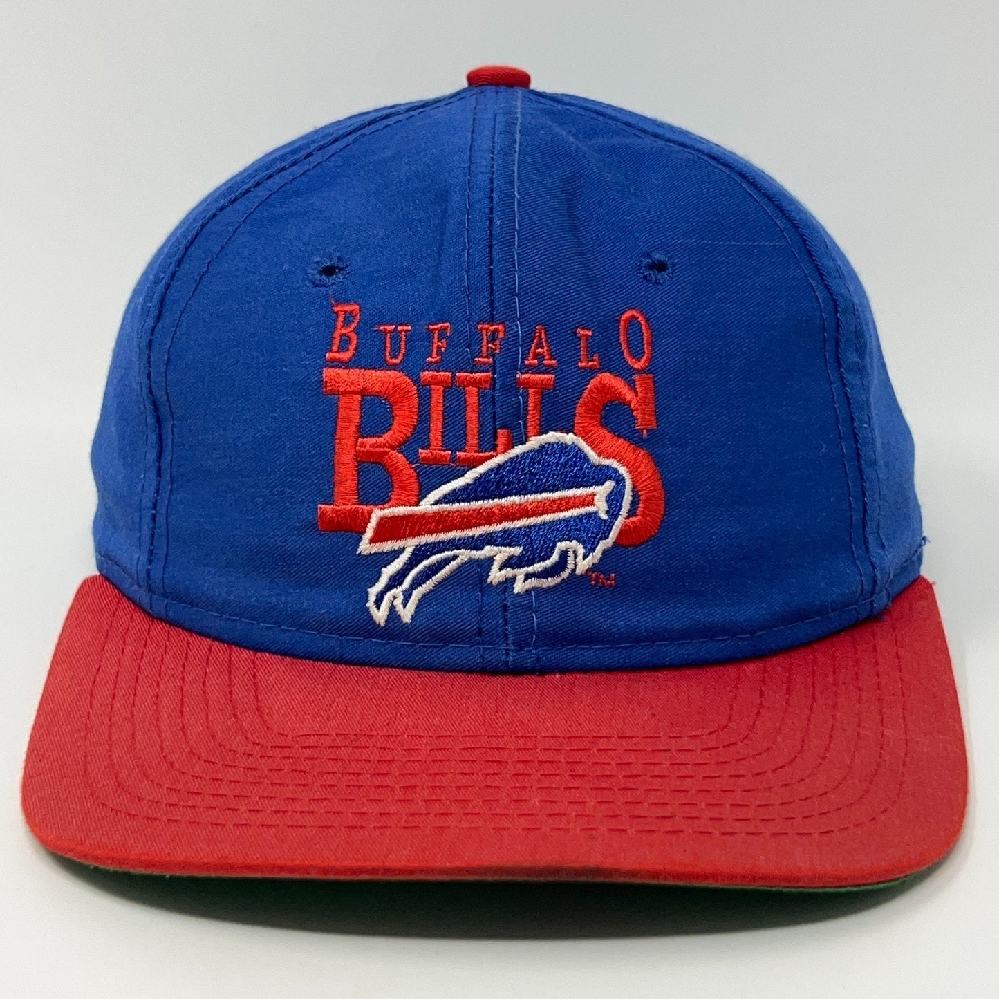 Blue Buffalo Bills Cap with Red Brim and Logo Emblem, Front View for Sports Fans