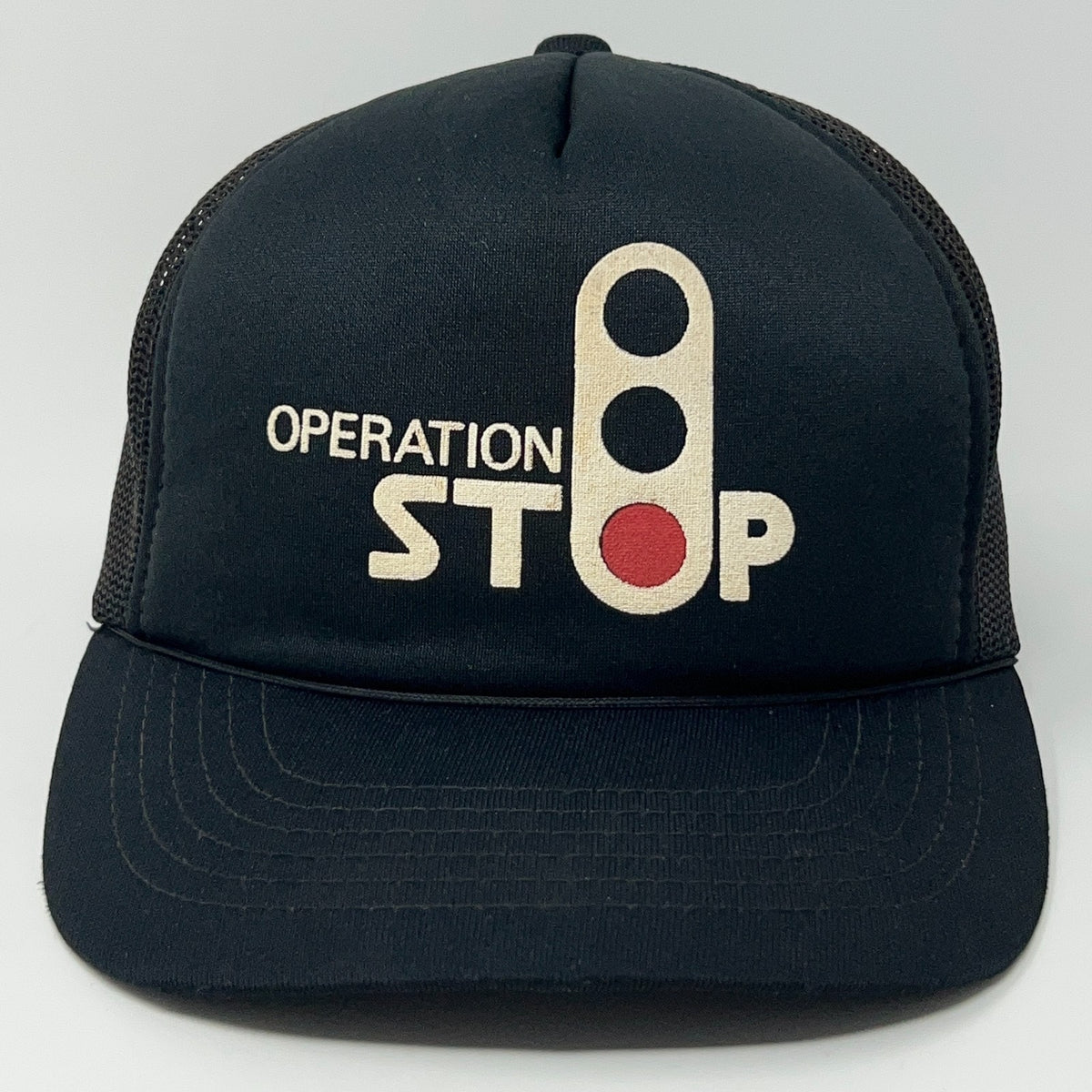 Black vintage cap featuring 'Operation Stop' graphic and Burlington Northern logo on the front
