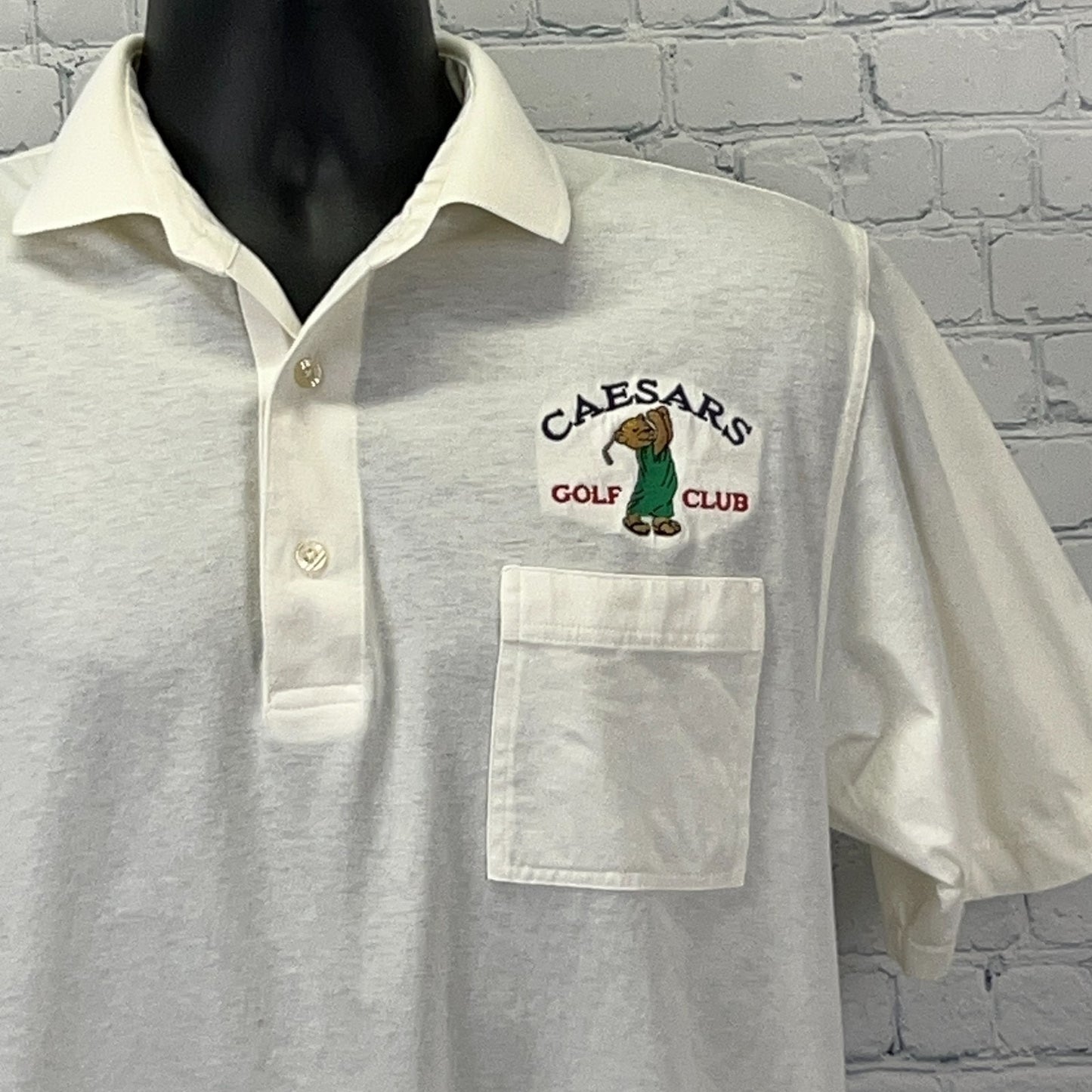 White Caesars Golf Polo with embroidered logo and front pocket, size medium, front view