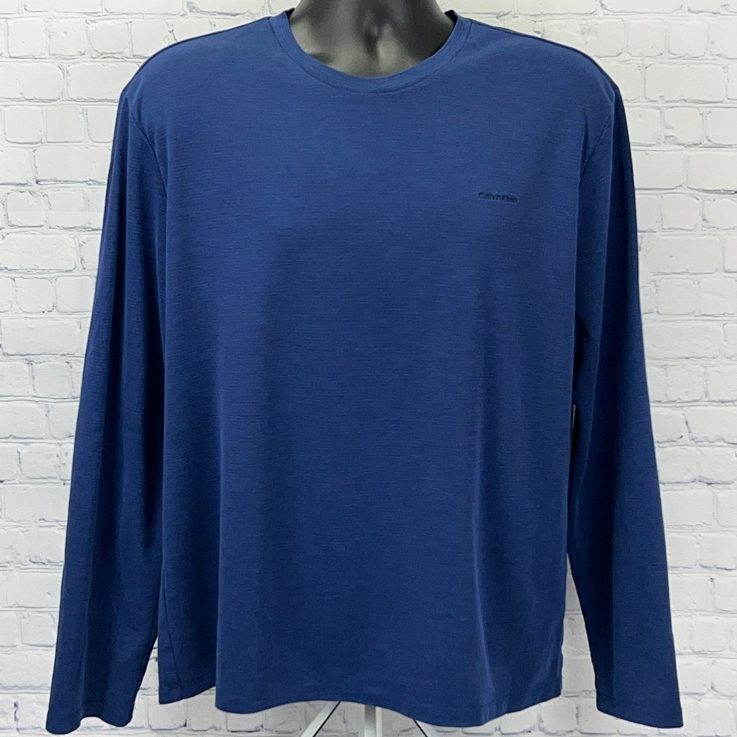Calvin Klein Long Sleeve Blue Shirt in Size X-Large with Logo Detail on Front