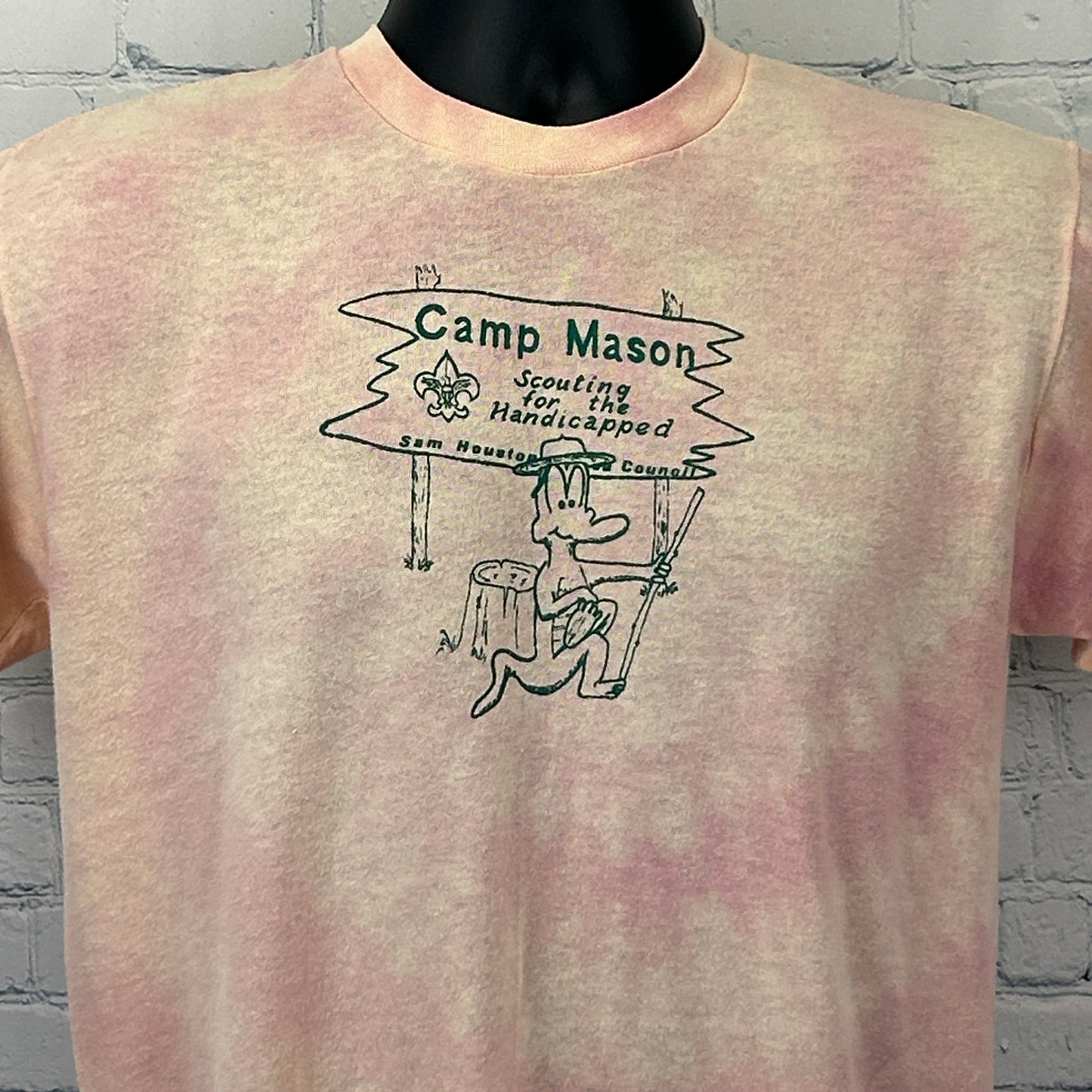 Front view of the peach tie-dye T-shirt featuring Camp Mason Scouting logo and unique art