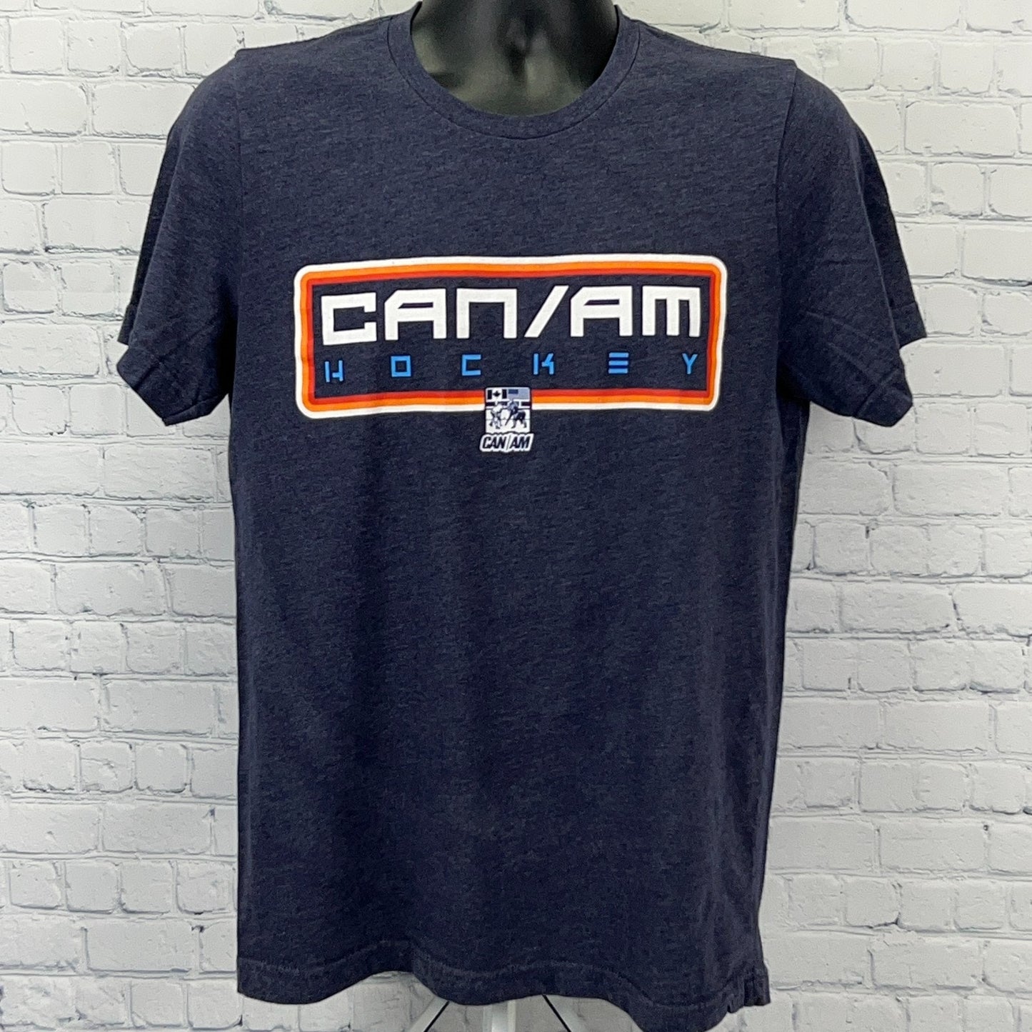 Navy CANAM Hockey T-shirt with bold logo in front for sports enthusiasts, available in various sizes
