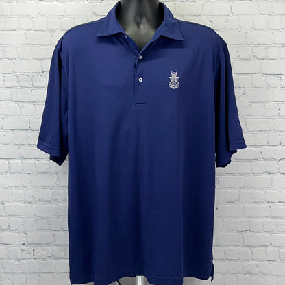 Navy blue polo shirt with a front logo of Capital City Club, featuring a relaxed fit and short sleeves