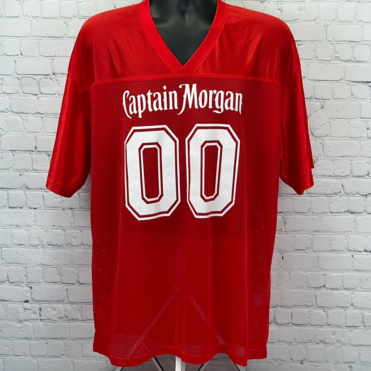 Captain Morgan Red Mesh Jersey with Bold 00 Design, Perfect for Casual Wear or Collectors