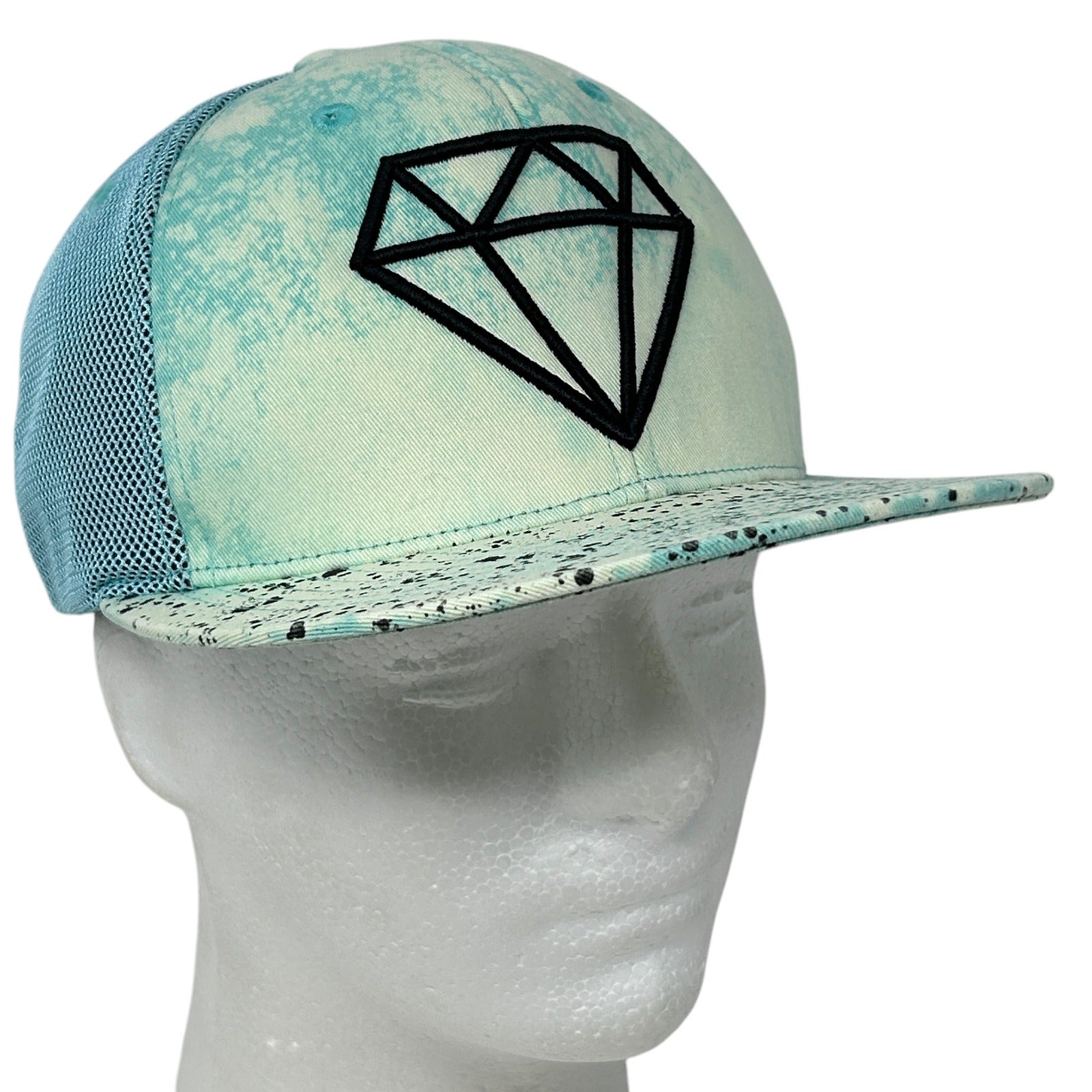 Front view of Carbon Elements Hat in blue with diamond logo and mesh back for casual style