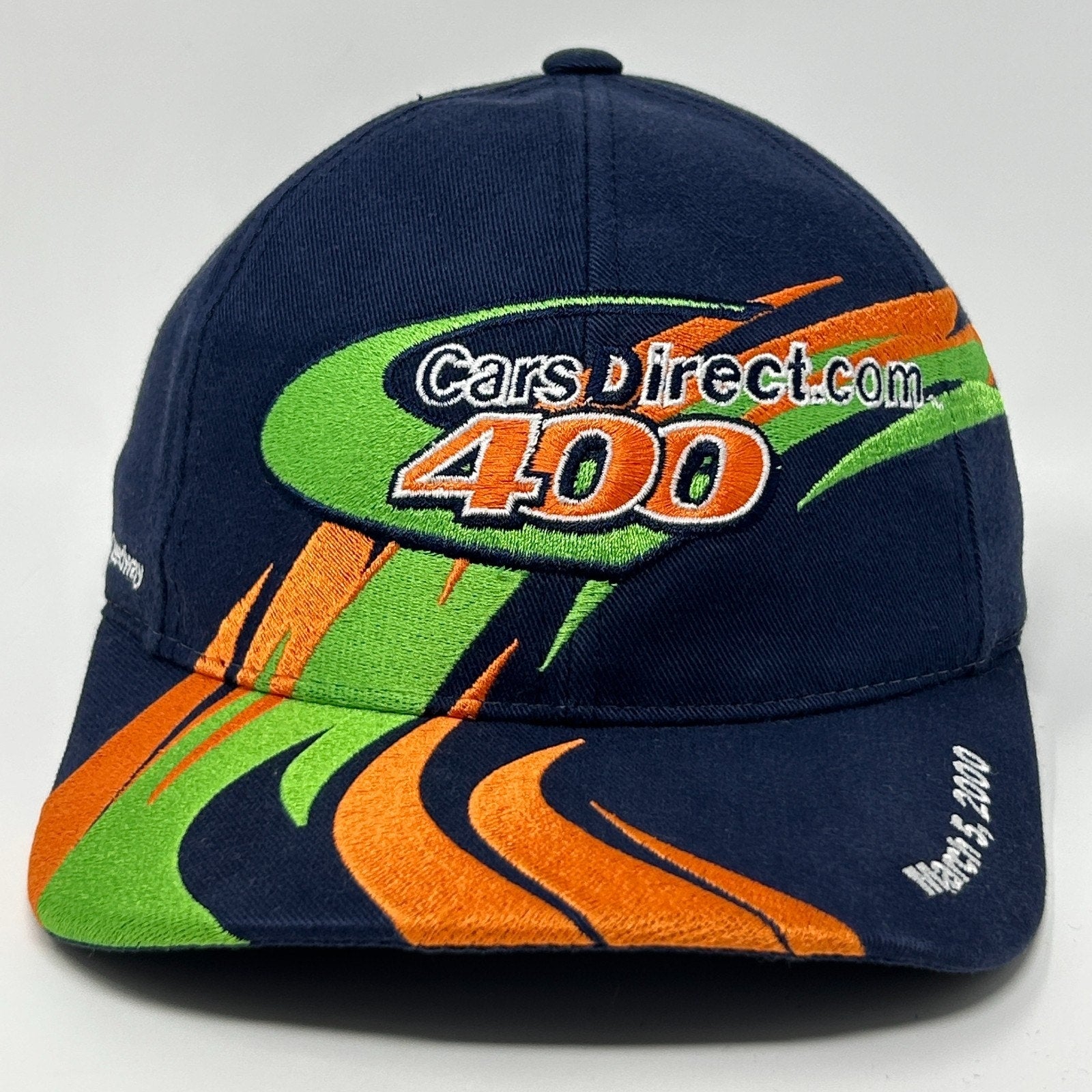Navy blue vintage NASCAR cap featuring CarsDirect.com 400 logo and vibrant graphics on the brim
