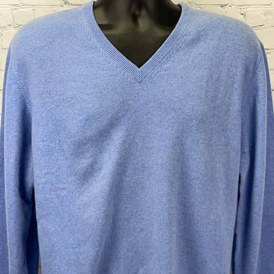 Front view of Joseph & Lyman light blue cashmere sweater in size medium with a V-neck design