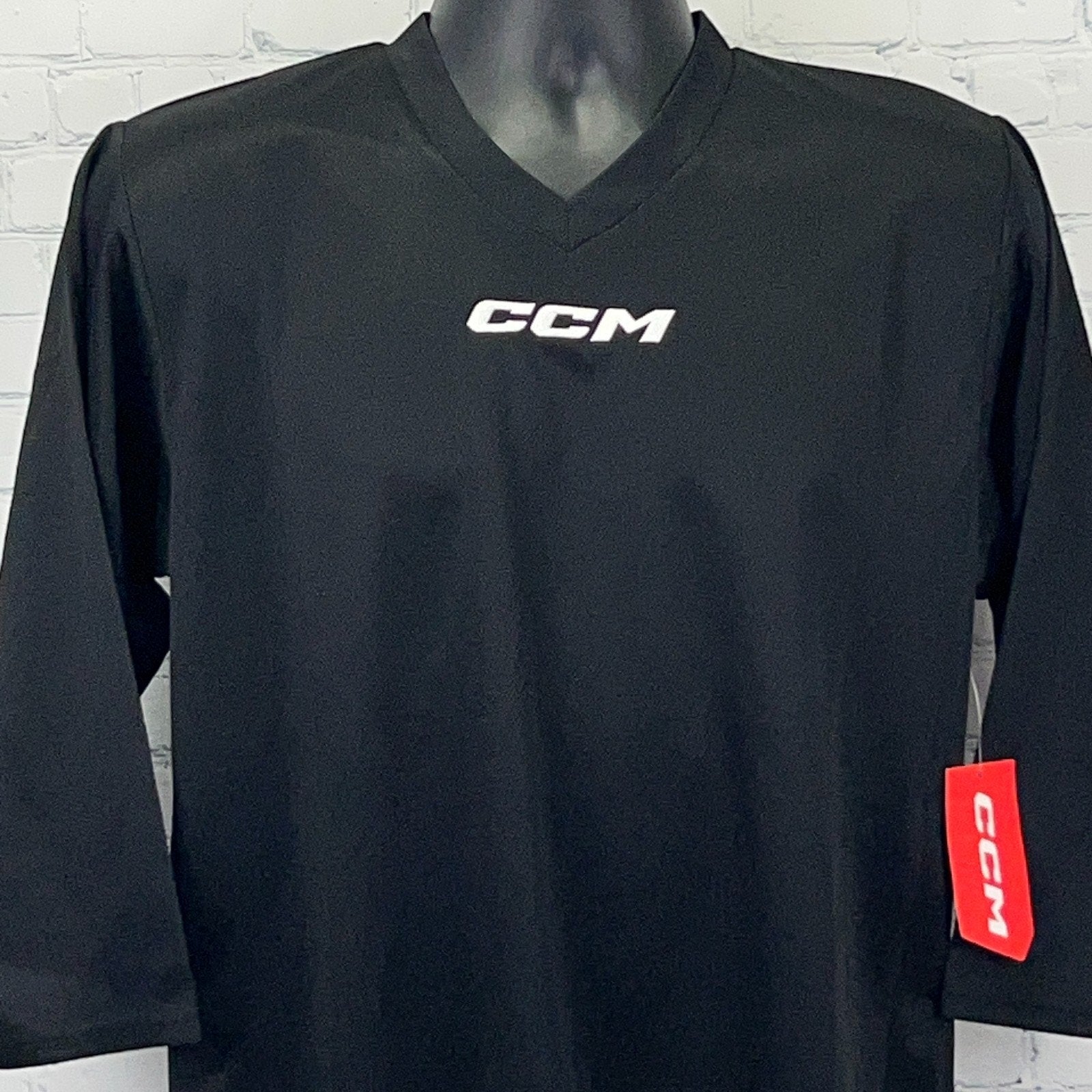 CCM Black Long Sleeve Jersey with V-Neck and Logo on Front, Size Available, Front View