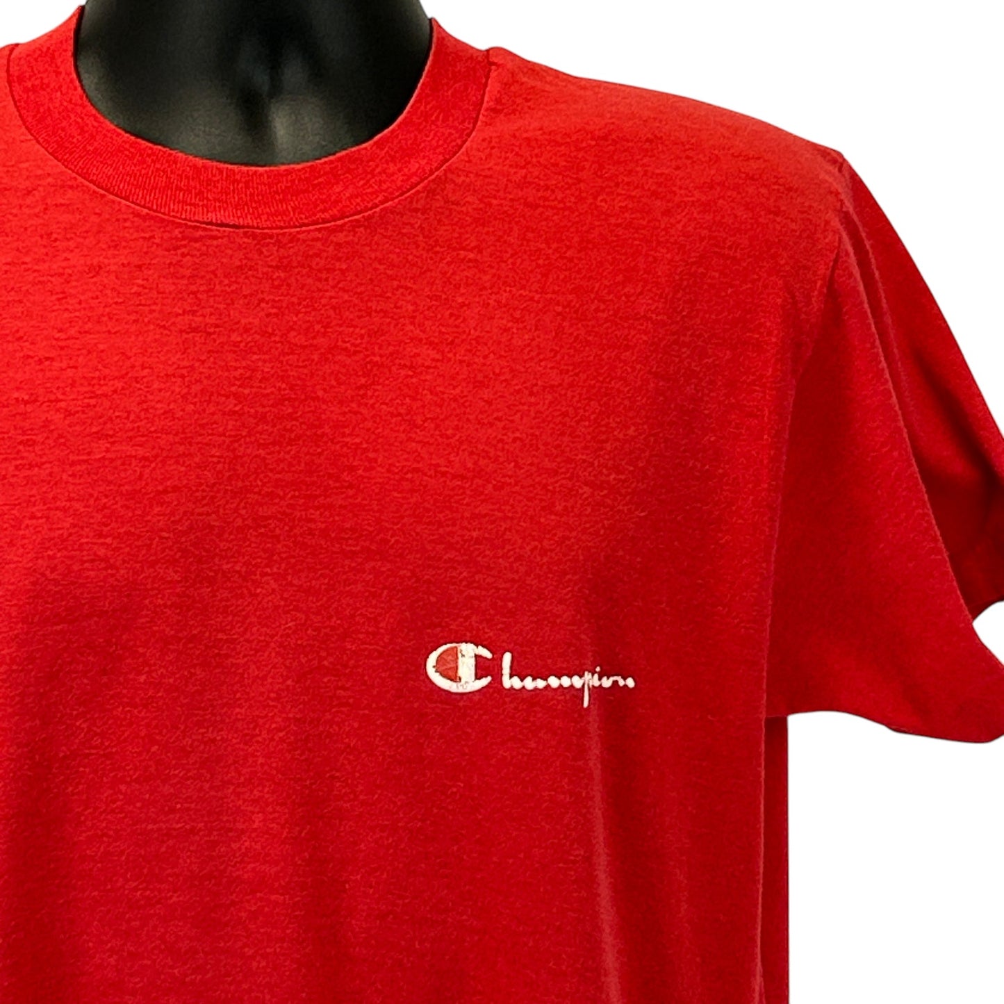 Red Champion T-Shirt in medium size featuring small logo on the front for casual style