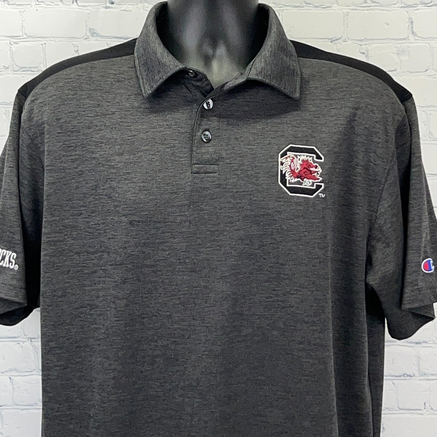 Champion South Carolina Gamecocks black polo shirt, front view with logo and details on collar and sleeves