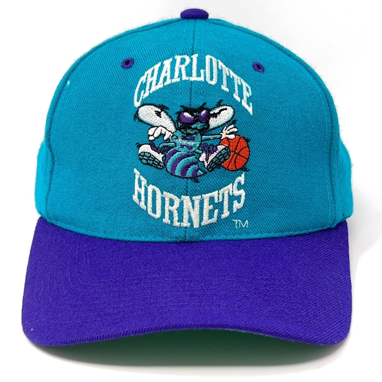 Charlotte Hornets Hat in teal and purple with embroidered logo on front for sports fans