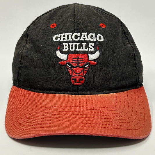 Men's Chicago Bulls Hat in black and orange with embroidered logo on front view