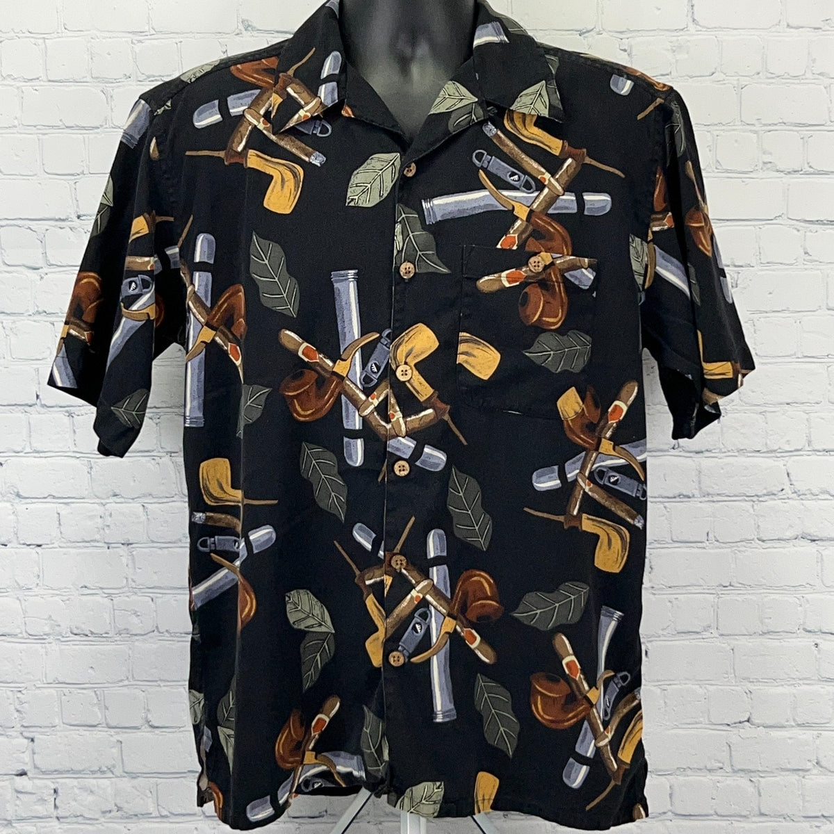 Black short-sleeve shirt featuring a cigar pattern, ideal for casual wear or summer outings