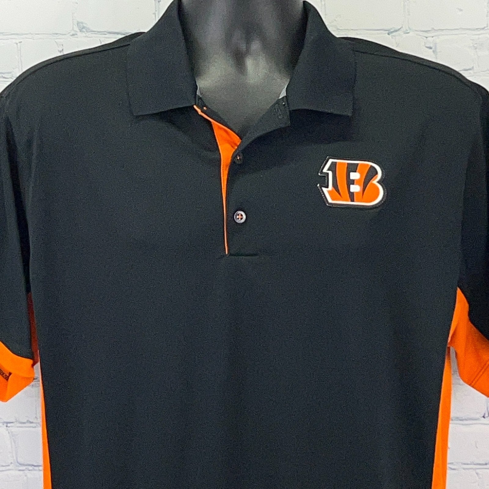 Nike Cincinnati Bengals Black Polo Shirt with Orange Accents and Team Logo on Front