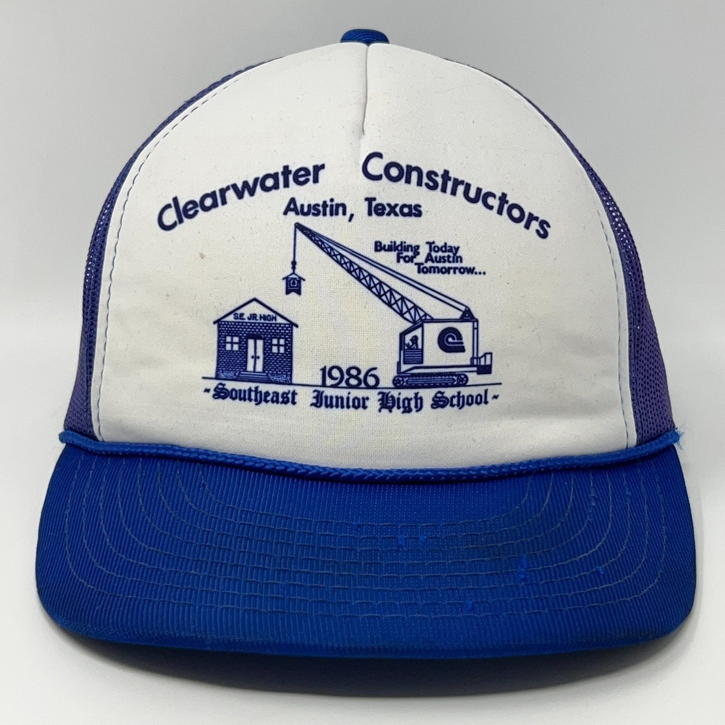 White and blue Vintage Trucker Hat by Hanes with 'Clearwater Constructors' logo and 1986 design
