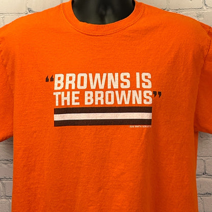 Cleveland Browns T Shirt in orange with bold text 'BROWNS IS THE BROWNS' on the front
