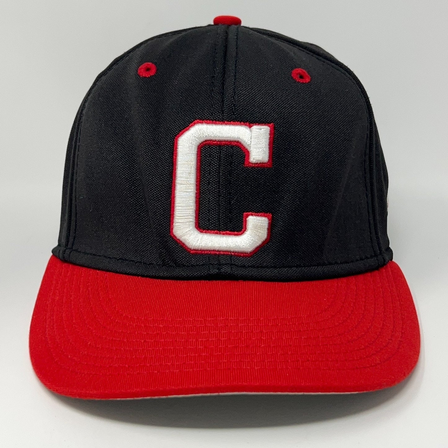 The Game Black Cleveland Guardians Hat with Red Bill and Front View