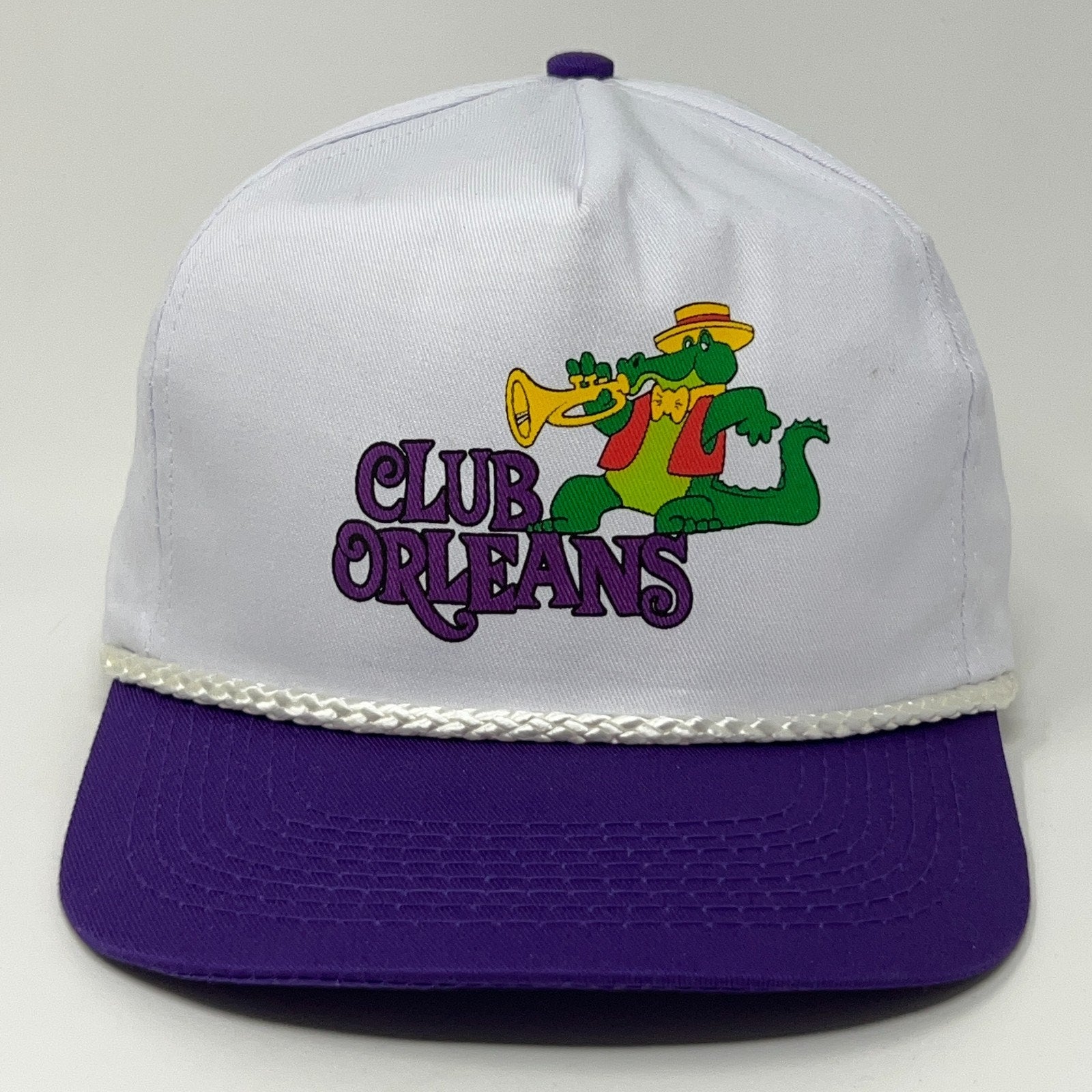 Vintage white Club Orleans cap with colorful crocodile logo, purple brim, and adjustable back, perfect for Las Vegas fans