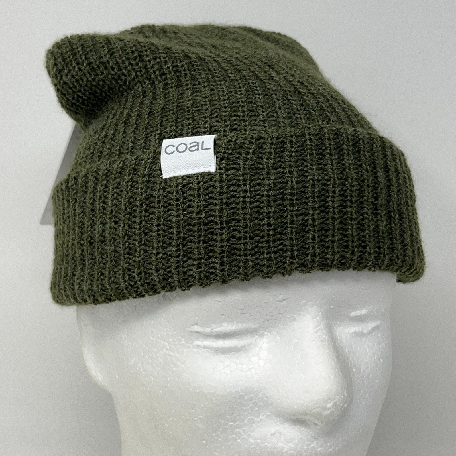 Olive green Coal Headwear beanie with a folded cuff and white logo tag on the front