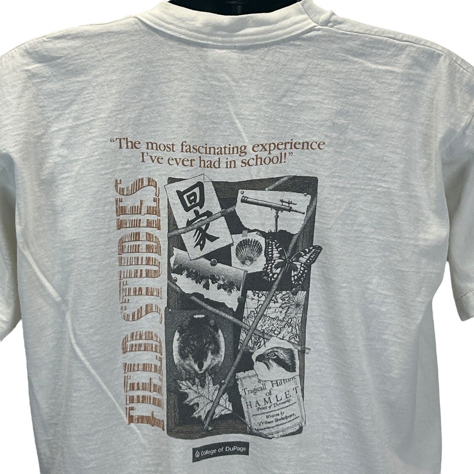 White Fruit of the Loom T-Shirt with College of Dupage graphic on back showcasing quotes and designs