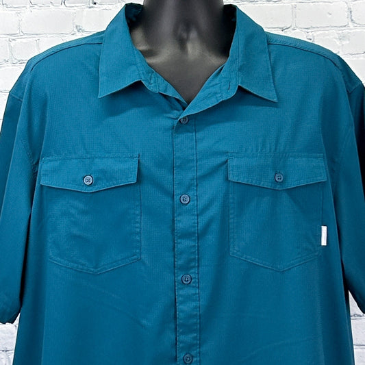 Teal Columbia Shirt in large size, featuring button-up front and two chest pockets for a stylish look