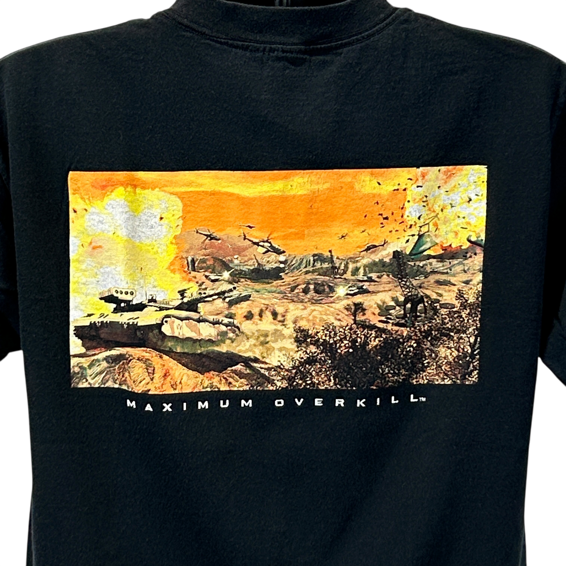 Vintage black T-shirt with Comanche Maximum Overkill graphic on the back featuring a war scene