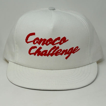 White Stylemaster hat with red Conoco Challenge logo, featuring a flat brim design for casual wear.