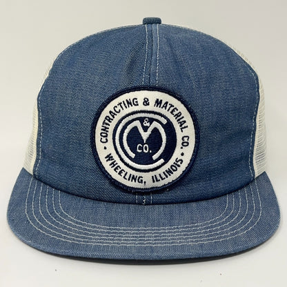 Vintage Contracting Material Co. trucker hat in denim blue with mesh back and logo patch
