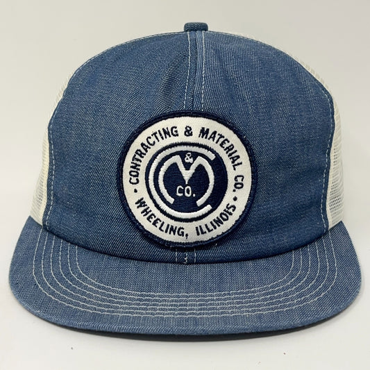 Vintage Contracting Material Co. trucker hat in denim blue with mesh back and logo patch