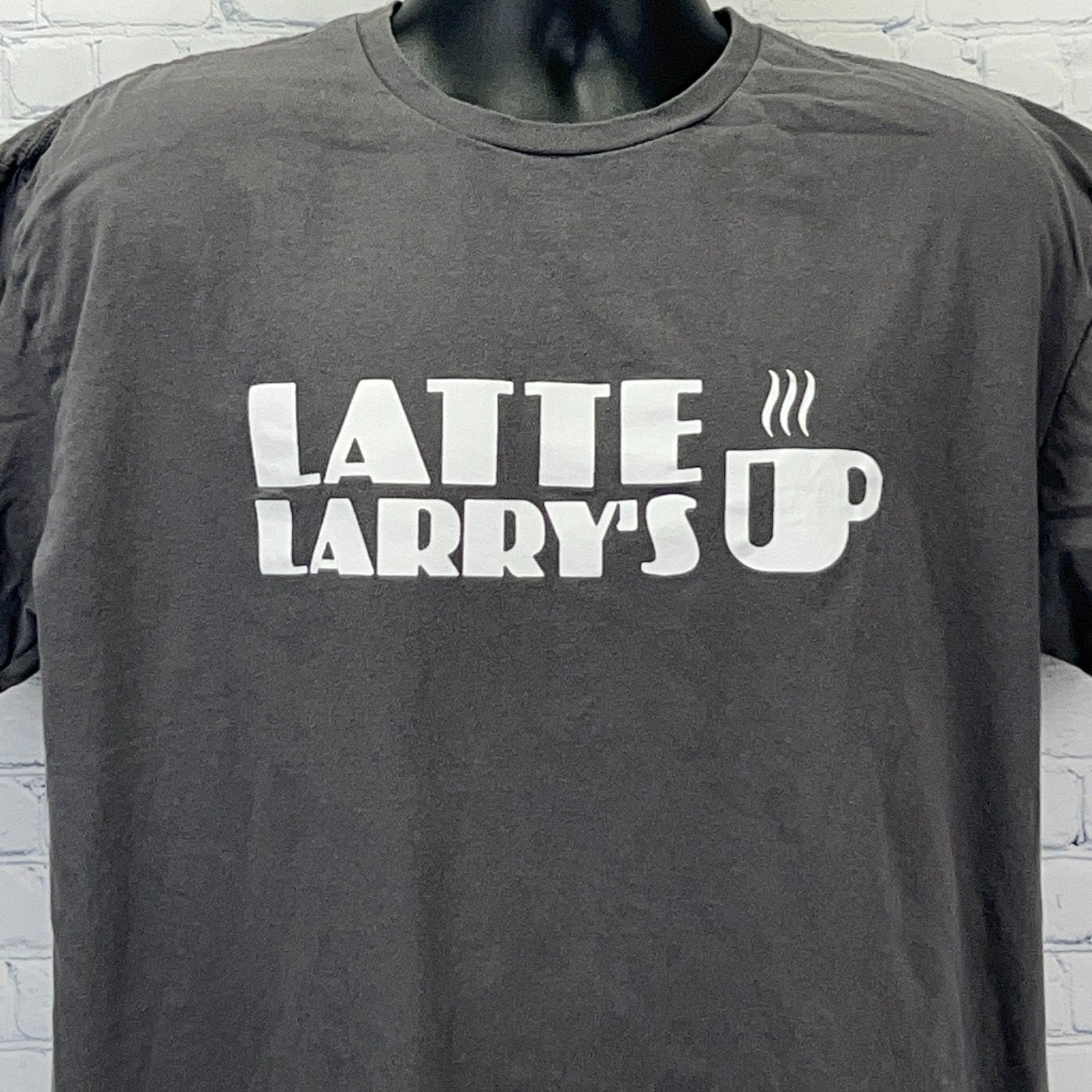 Gildan dark gray T-shirt featuring 'Latte Larry's Up' print, front view, perfect for Curb Your Enthusiasm fans