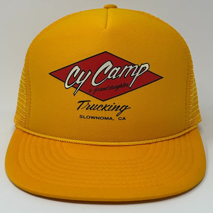 Vintage yellow Trucker Hat featuring Cy Camp Trucking logo on the front with mesh backing
